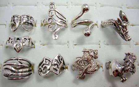  solid 925. sterling silver fashion rings in an assortment of designs picked randomly by our warehouse staff
